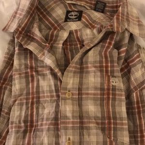 Long sleeve Timberland button down shirt.